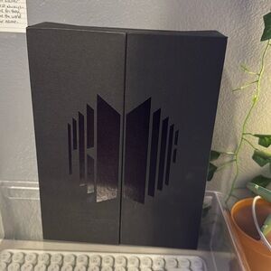 BTS Proof Album: photo cards, booklets, and DVD’s provided in the album.